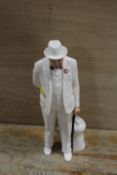 A ROYAL DOULTON FIGURE OF SIR WINSTON CHURCHILL IN WHITE HN3057