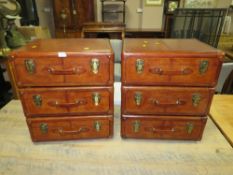 A PAIR OF MODERN LEATHER EFFECT SUITCASE BEDSIDE CHESTS H-62 W-54 CM (2)