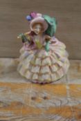 AN UNUSUAL ROYAL DOULTON POSSIBLE PROTOTYPE FIGURINE 'HINGED PARASOL' HN1578