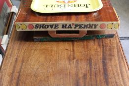 A VINTAGE TREEN SHOVE HA'PENNY BOARD TOGETHER WITH A VINTAGE JOHN BULL BITTER TRAY