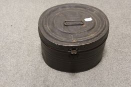 A METAL HAT BOX CONTAINING A CHRISTYS OF LONDON TOP HAT PLUS A HOMBURG TYPE TRILBY