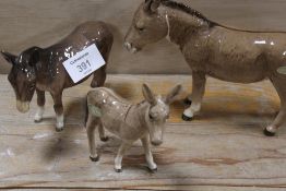 TWO BESWICK DONKEYS WITH A FOAL (3)S/D