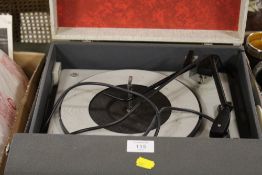 A VINTAGE CO-OP SOLID STATE RECORD PLAYER TOGETHER WITH A NOVELTY FRAMED AND GLAZED VINTAGE CAR