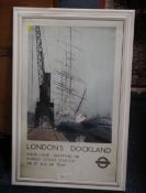 A VINTAGE STYLE FRAMED LONDON DOCKLANDS POSTER