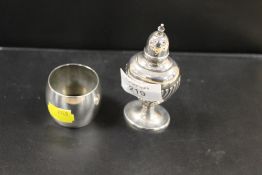 A HALLMARKED SILVER PEPPERETTE TOGETHER WITH A HALLMARKED SILVER NAPKIN RING (2)