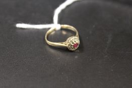 A HALLMARKED 9CT GOLD RUBY RING - APPROX 1.3 G