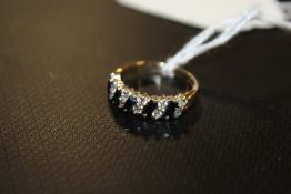 A HALLMARKED 9CT GOLD DRESS RING - APPROX 3 G