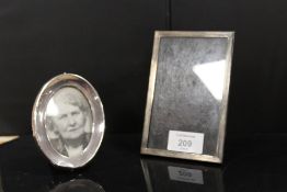 TWO SMALL HALLMARKED SILVER PHOTO FRAMES
