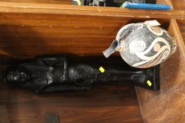 A LARGE EGYPTIAN FIGURE TOGETHER WITH A REPLICA MODEL OF AN EGYPTIAN PITCHER