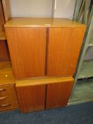 A PAIR OF MID-CENTURY TEAK MUSIC CABINETS (2)