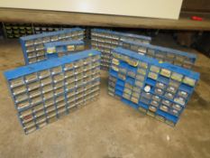 AN ASSORTMENT OF PLASTIC ORGANISER DRAWERS CONTAINING RESISTORS, CAPACITORS, I C CHIPS, SCREWS AND