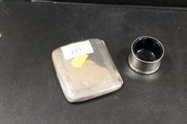 A HALLMARKED SILVER CIGARETTE CASE TOGETHER WITH A HALLMARKED SILVER SALT DISH (2)