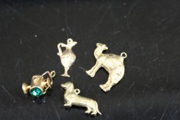 FOUR 9CT GOLD CHARMS