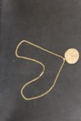A LONDON HALLMARKED 9CT GOLD PENDANT ON FACETED LINK CHAIN STAMPED 9.C - APPROX WEIGHT 19.9 G
