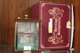 A HERITAGE SCULPTURES GLASS CASED MODEL OF A TIGER MOTH