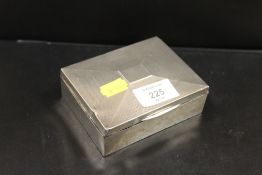 A HALLMARKED SILVER CIGARETTE BOX