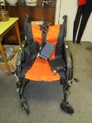 A COLLAPSIBLE WHEELCHAIR