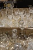 TWO TRAYS OF ASSORTED GLASSWARE TO INCLUDE DECANTERS, WINE GLASSES ETC