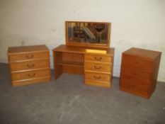 A 2 PIECE ASH BEDROOM SUITE TO INCLUDE A DRESSING TABLE A 3 DRAWER CHEST AND A MATCHED CHEST OF