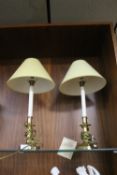 A PAIR OF BRASS TABLE LAMPS
