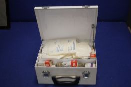A VINTAGE FIRST AID BOX AND CONTENTS
