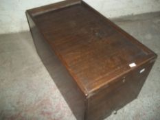 AN OAK TAMBOUR DRAWER