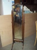 AN ANTIQUE OAK DRESSING MIRROR