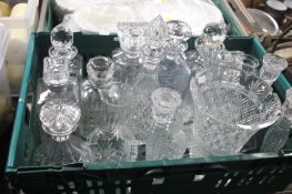 A TRAY OF MAINLY CUT GLASS DECANTERS (TRAY NOT INCLUDED)