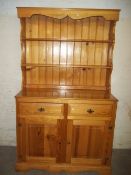 A SOLID PINE WELSH DRESSER