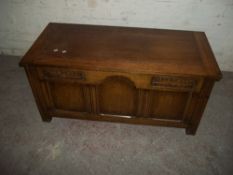 AN OAK PANNELLED BLANKET CHEST