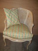 A FRENCH STYLE RATTAN OCCASIONAL CHAIR