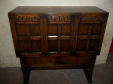 AN OAK MID CENTURY SIDEBOARD