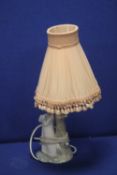 A CERAMIC FIGURATIVE TABLE LAMP