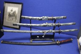 FOUR SAMURAI SWORDS