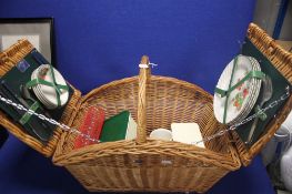 AN ANTLER WICKER PICNIC HAMPER