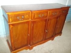 A YEW BREAK FRONT SIDEBOARD
