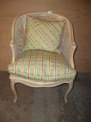 A FRENCH STYLE RATTAN OCCASIONAL CHAIR
