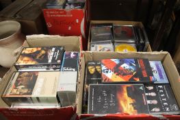 A QUANTITY OF CDS, VIDEO TAPES ETC