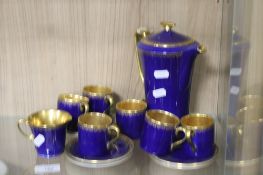 A DECORATIVE BLUE PAINTED CROWN DEVON COFFEE SET