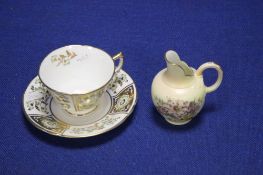 A ROYAL CROWN DERBY GREEN PANEL CUP AND SAUCER TOGETHER WITH A ROYAL WORCESTER BLUSH IVORY VASE