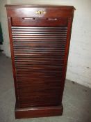 A TAMBOUR CABINET