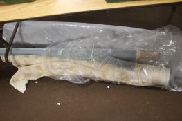 A QUANTITY OF ROLLS OF FABRIC