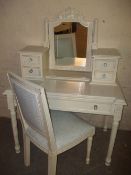 A MODERN FRENCH STYLE DRESSING TABLE AND A CHAIR