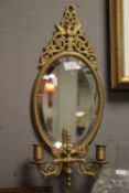 A GIRONDELLE MIRROR FITTED WITH DOUBLE CANDLE HOLDER, WITH IMPRESSED REGISTRATION DIAMOND TO BACK