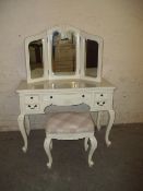 A MODERN FRENCH STYLE DRESSING TABLE WITH A STOOL AND A TRIPLE MIRROR