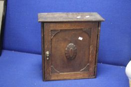 AN ANTIQUE SMOKERS CABINET