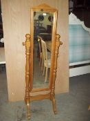 A SOLID PINE FULL LENGTH DRESSING MIRROR