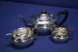 A HALL MARKED SILVER THREE PIECE TEA SET