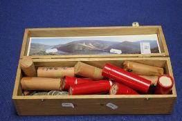 A WOODEN PORT BOX CONTAINING A LARGE QUANTITY OF BRITISH 1 SHILLING COINS
