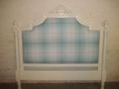 A LARGE PADDE FLOOR STANDING HEADBOARD